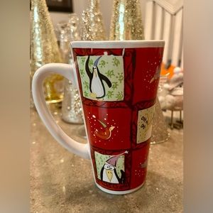 Tall super cute penguin mug.